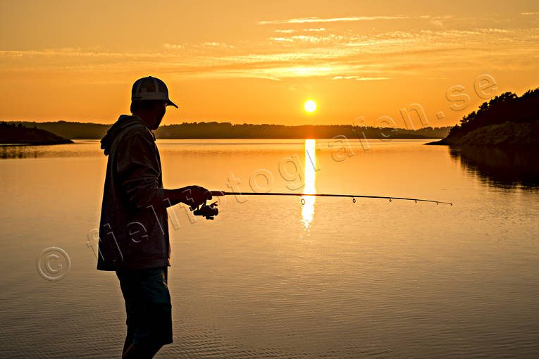 fiskare, haspel, hav, kustfiske, orange, solnedgång, sommar, sportfiske, årstider