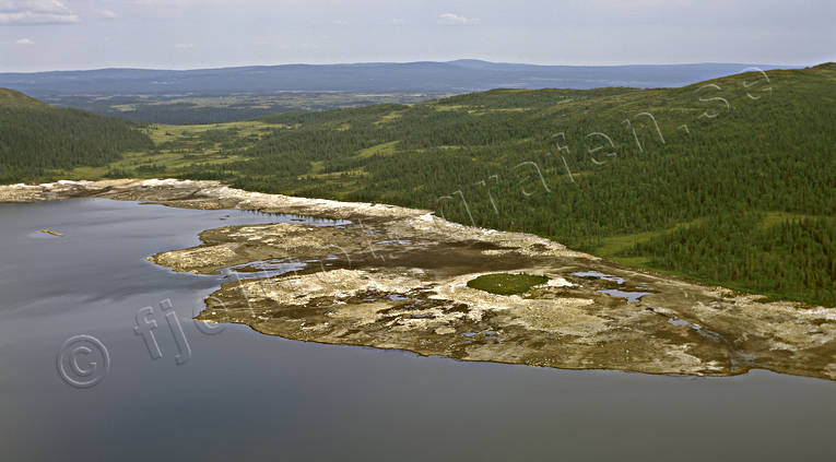 Stränder i vattenmagasin arbete, elkraft, elproduktion, energi, energiproduktion, kraftstation, kraftverk, kraftverksdamm, lågt, miljö, miljöförstöring, miljöpåverkan, miljöskada, miljövård, stränder, tappat, urtappat, vattenkraft, vattenstånd, öde, öken